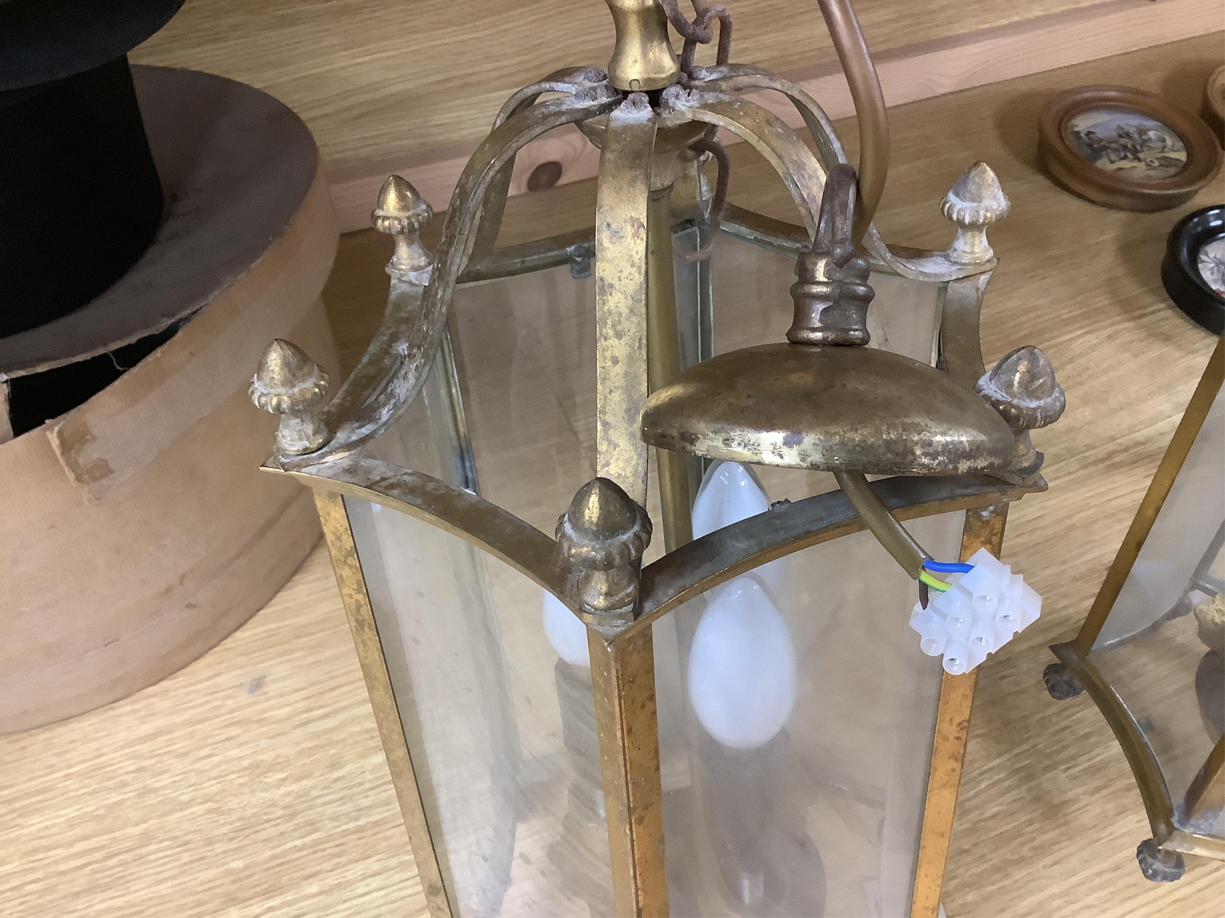 A pair of brass porch / hall lanterns, 50cm high